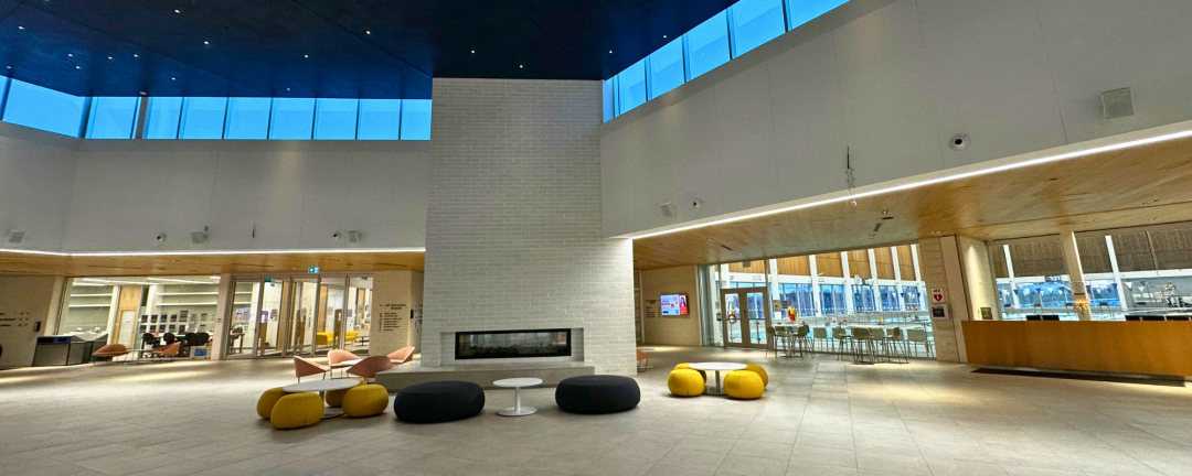 Inside the multi-use recreation complex with the fireplace