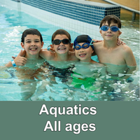 Group of children in pool with green bar with words Aquatics All Ages