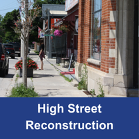 Empty downtown street with blue banner and the words High Street Reconstruction