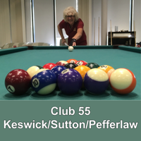 older adult playing pool