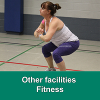 Woman doing a squat in a gymnasium