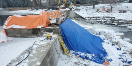 Dam covered in tarps