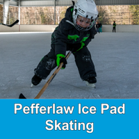 child skating at outdoor rink