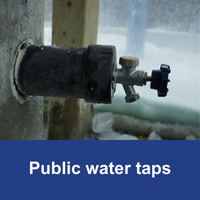 metal water tap with blue bar and text public water taps