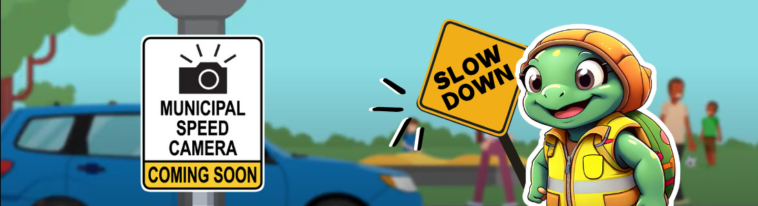 cartoon picture of a turtle with a sign that says slow down and a sign that says Municipal Speed Camera Coming Soon