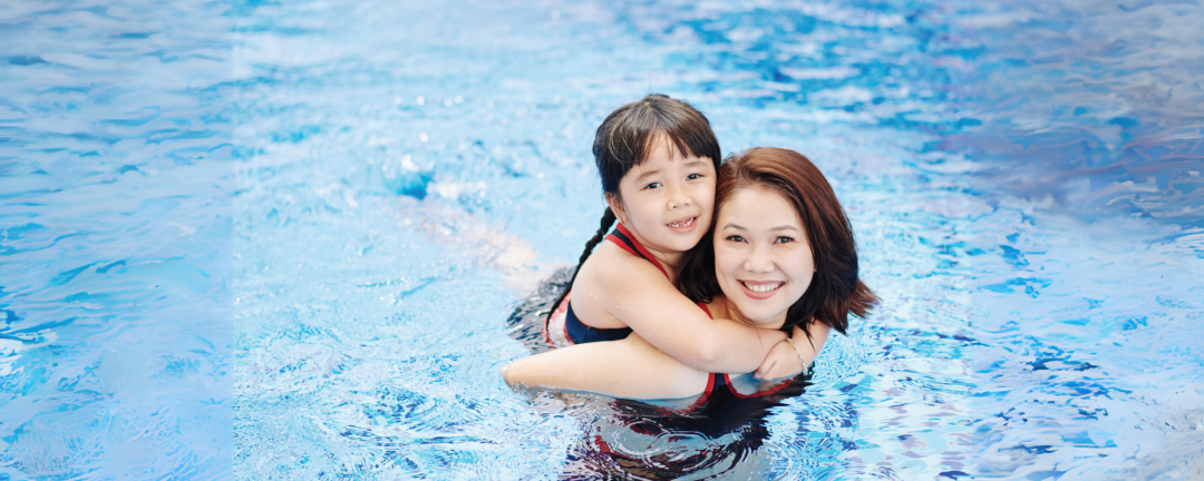 mother and daughter in a swimming pool